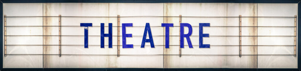 Marquee sign that says "Theatre"